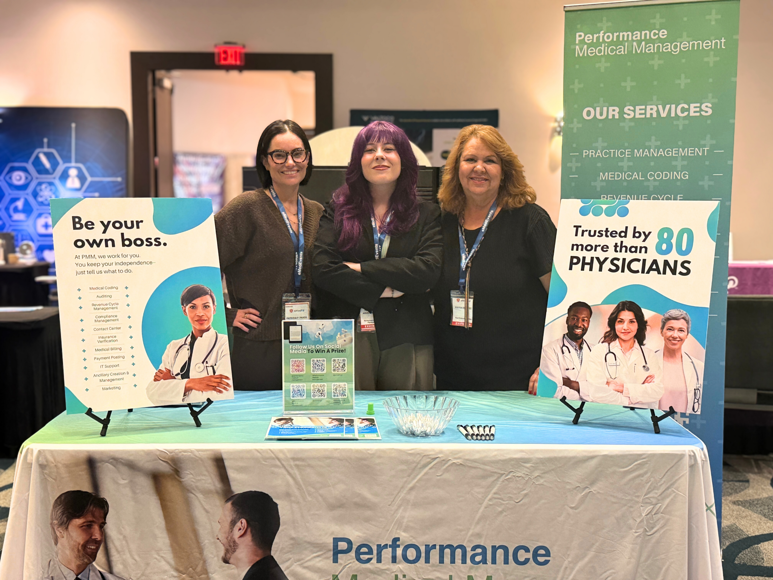 A decorative background of a rainbow gradient with white, thin, wavy lines.